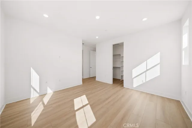 a bathroom with a granite countertop shower sink and vanity