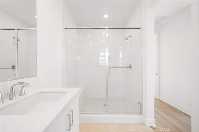 a view of a swimming pool with outdoor seating