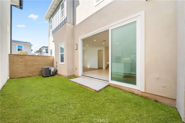 a view of a lake with boats and palm trees