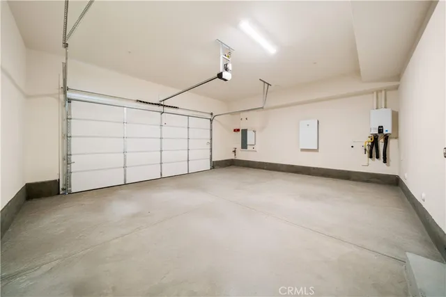 a view of a house with swimming pool and sitting area