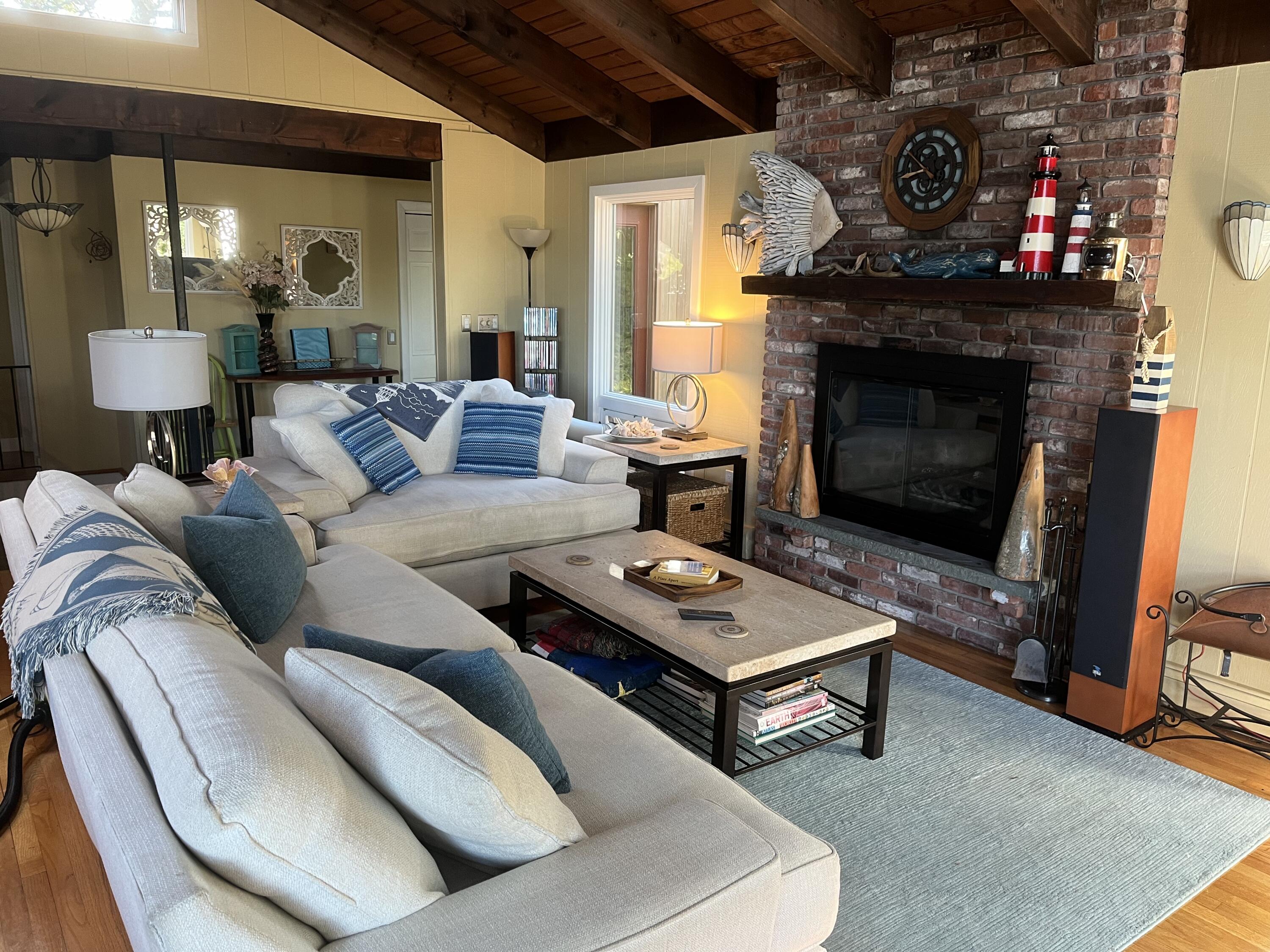 9 Kinnikinnick Road Truro, MA 02666 - Photo 5 of 38 GREAT ROOM FIRE PLACE SEATING AREA