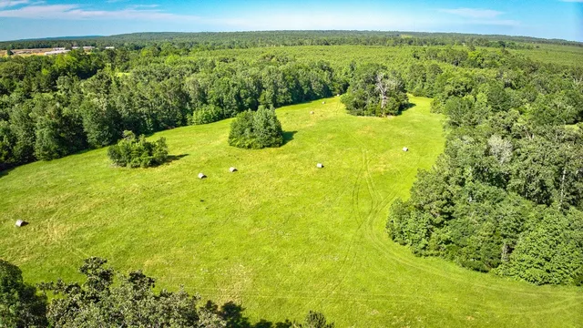 a view of a lake with a yard