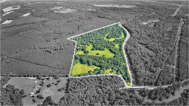 an aerial view of beach and ocean