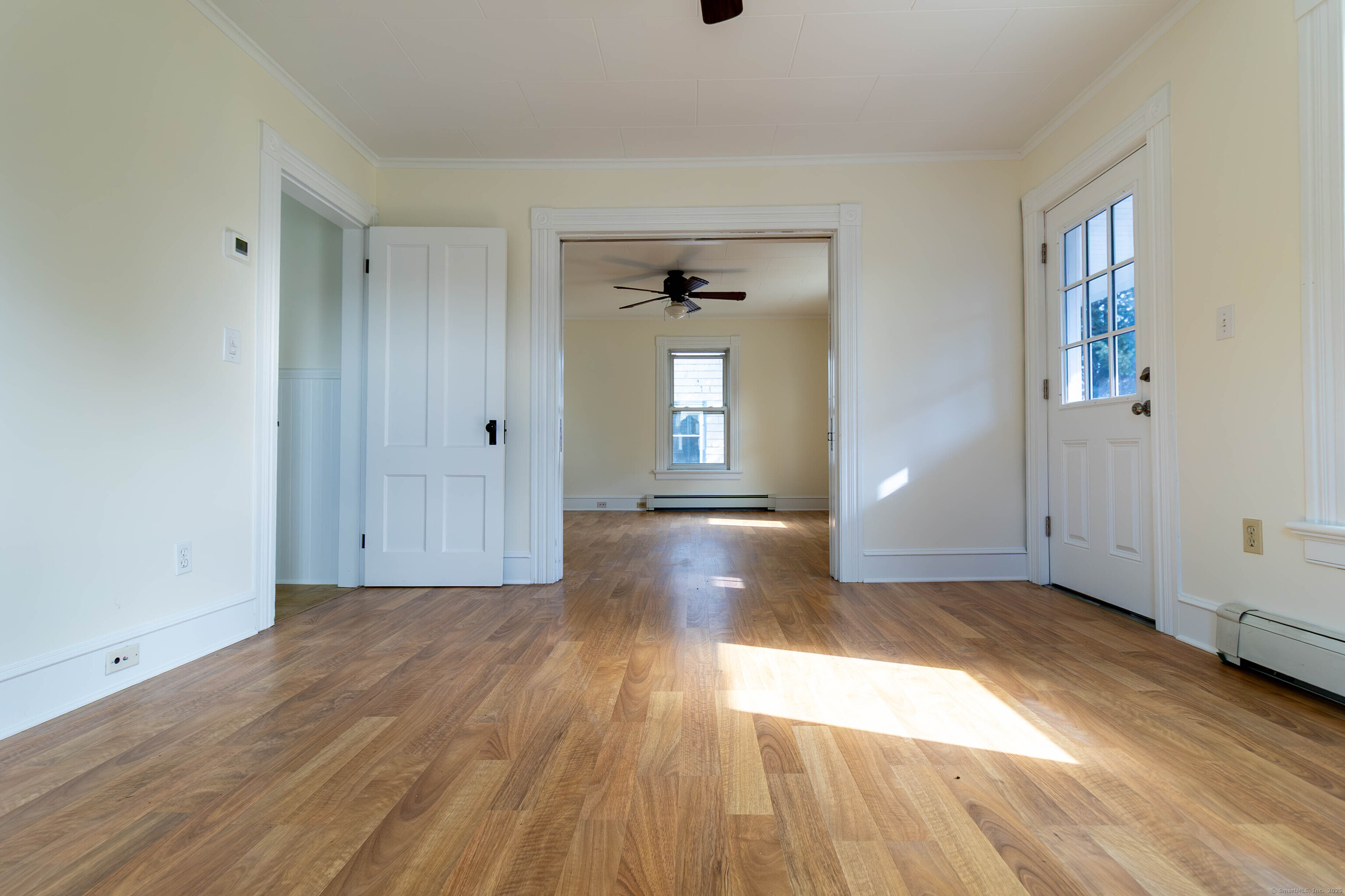 62 Lincoln Avenue Torrington, CT 06790 - Photo 12 of 15 wooden floor in an empty room with a window