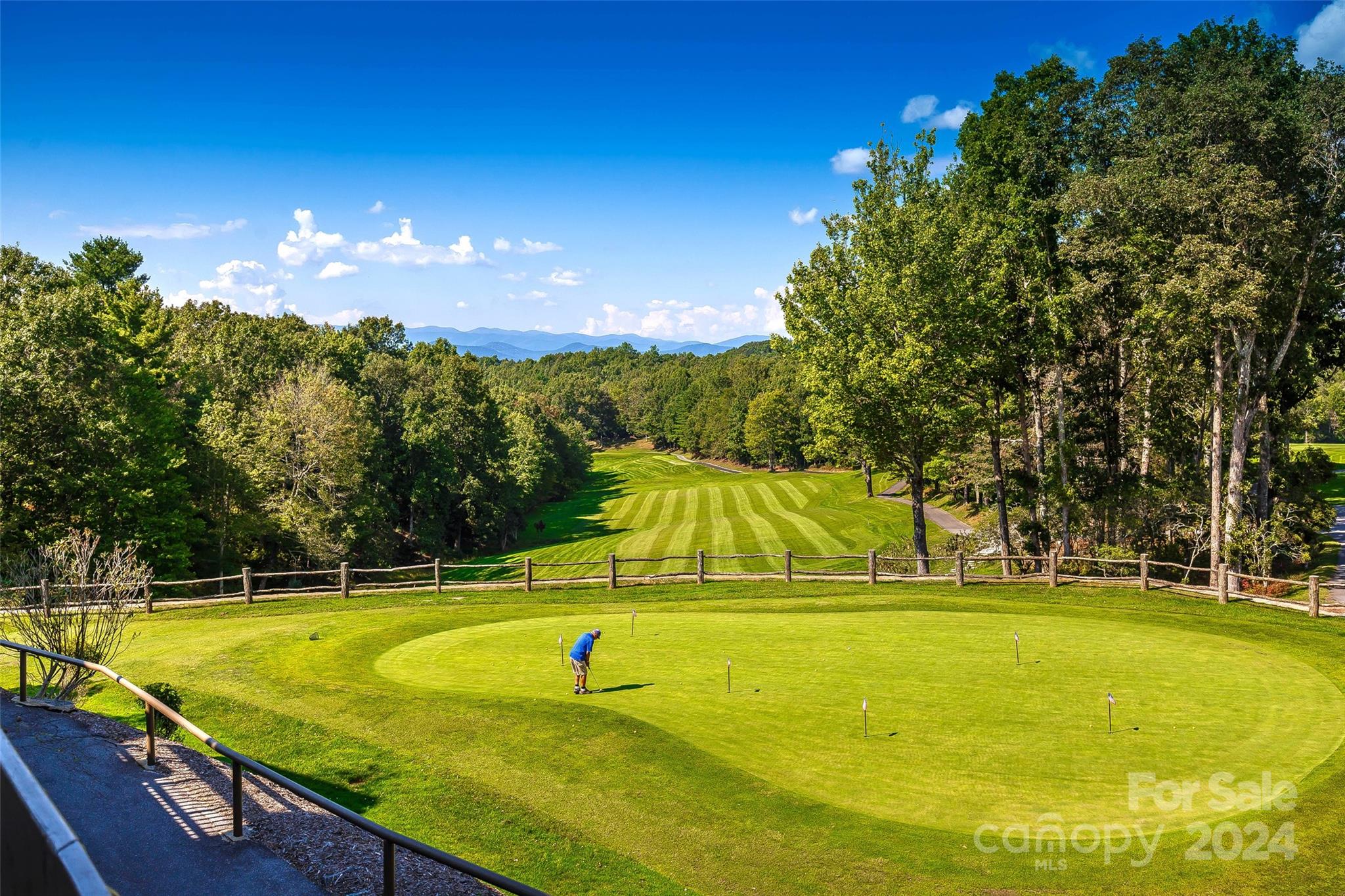 U22-l019 Cheulah Road, Unit 19/22 Brevard, NC 28712 - Photo 8 of 13 a view of a swimming pool with an outdoor space and seating area