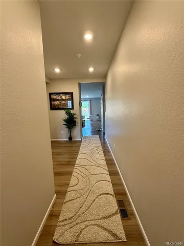 a view of a garden with a building in the background