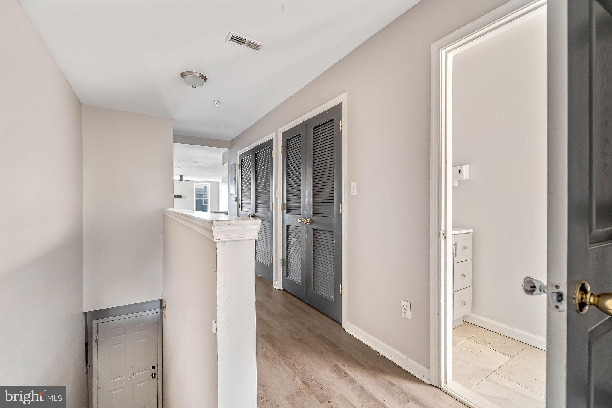 139 State Street Camden, NJ 08102 - Photo 14 of 29 a view of a kitchen from the hallway