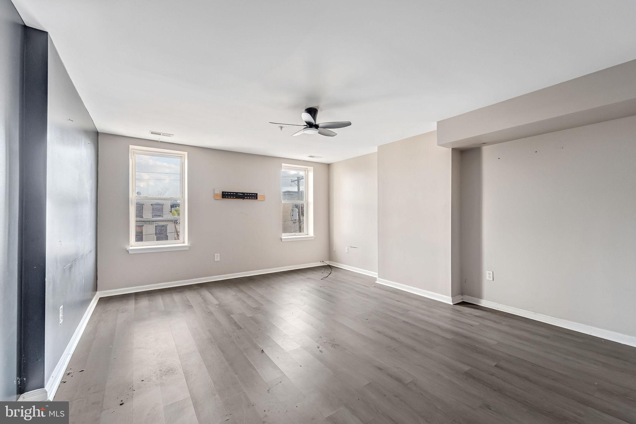 139 State Street Camden, NJ 08102 - Photo 10 of 29 wooden floor in an empty room with a window