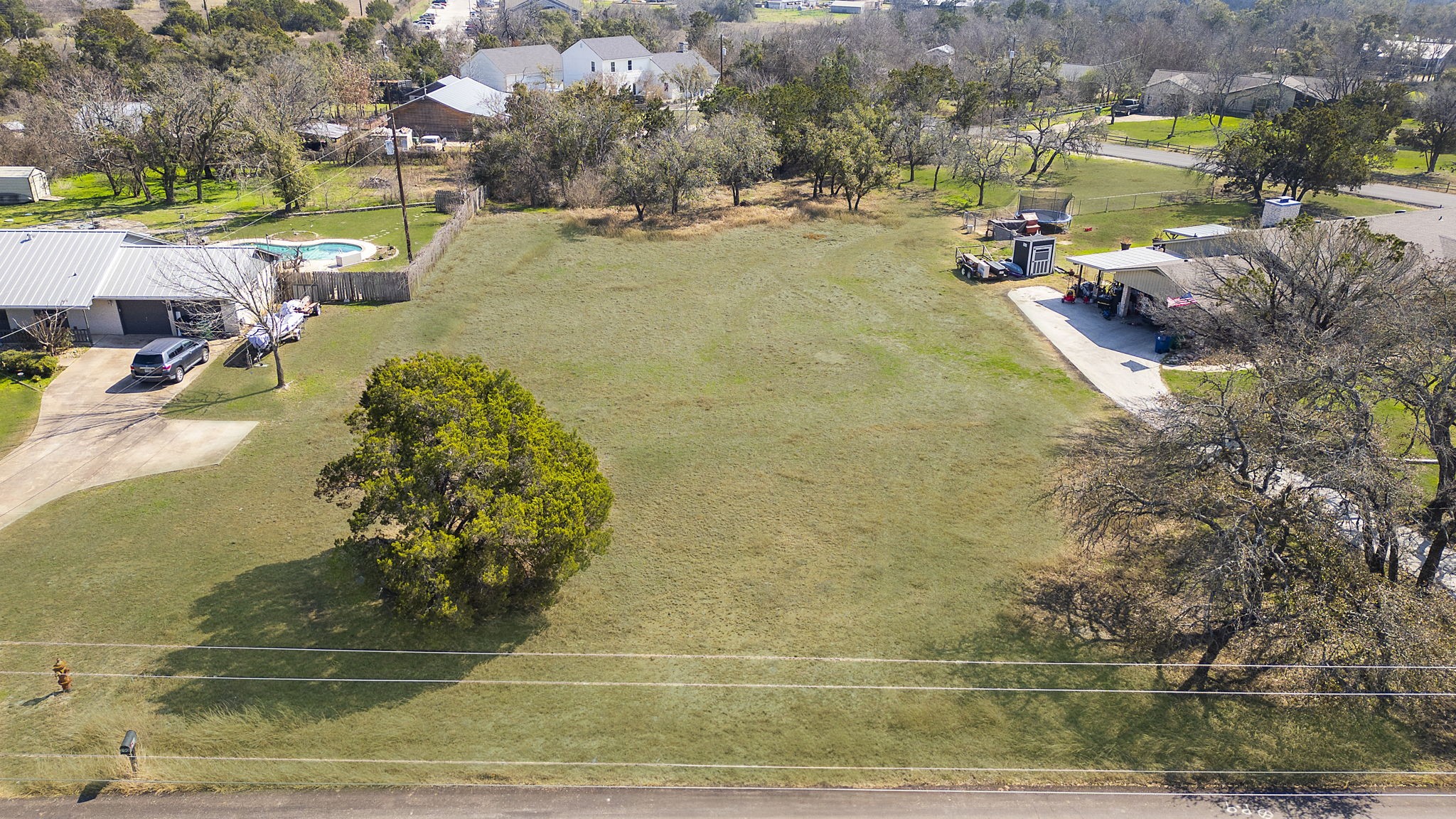 201 Retha Drive Dripping Springs, TX 78620 - Photo 1 of 12 .78 acre flat lot