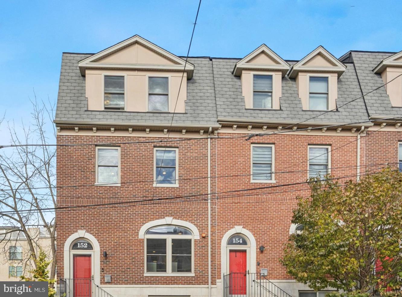 152 Carson Street Philadelphia, PA 19127 - Photo 23 of 33 a front view of a house with a yard