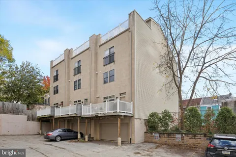 a building view with balcony and patio