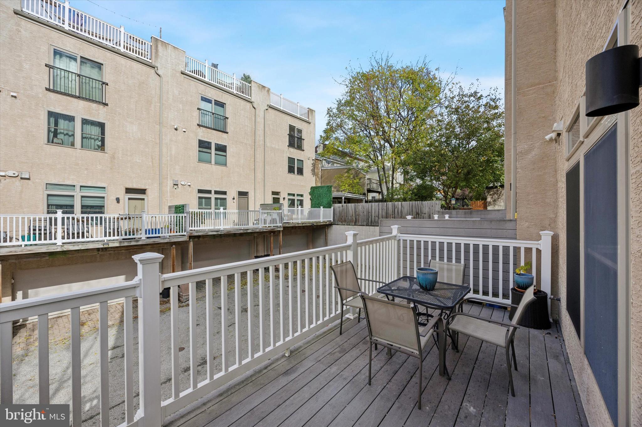 152 Carson Street Philadelphia, PA 19127 - Photo 7 of 33 a view of a chair and table on the deck