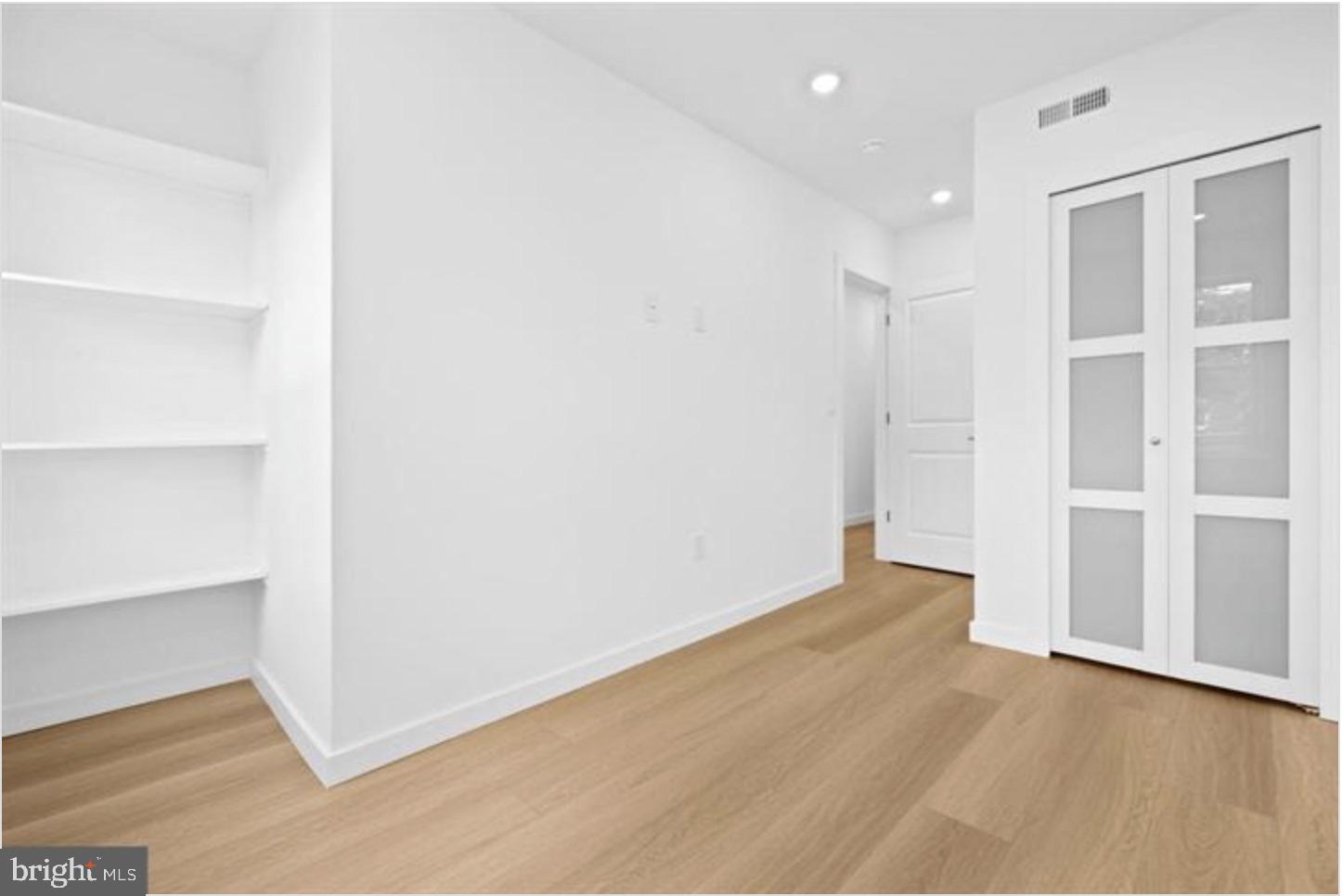 2215 Mutter Street Philadelphia, PA 19133 - Photo 17 of 21 a view of an empty room with wooden floor