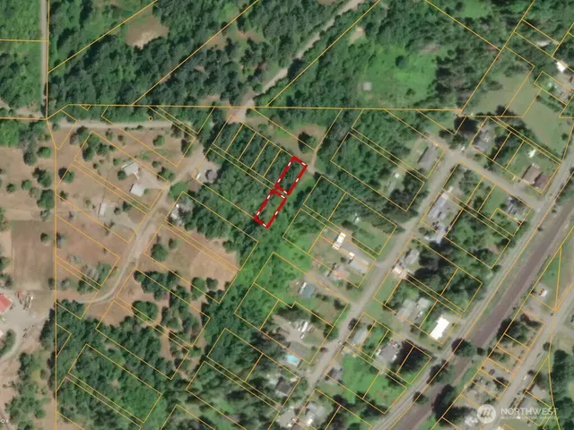 a backyard of a building with lots of green space