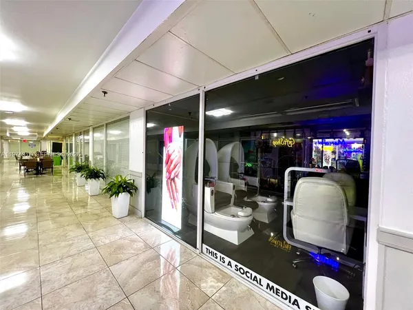 a view of a dining area with furniture and window