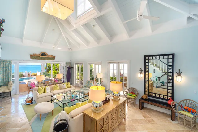 a kitchen with stainless steel appliances granite countertop a sink and a refrigerator