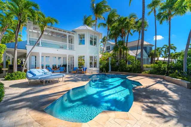 a view of a house with a swimming pool