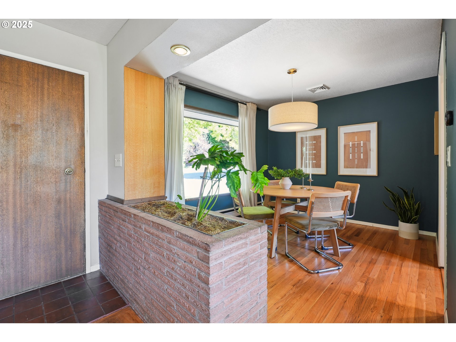 5820 Southwest Miles Court Portland, OR 97219 - Photo 2 of 48 a living room with furniture and a large window