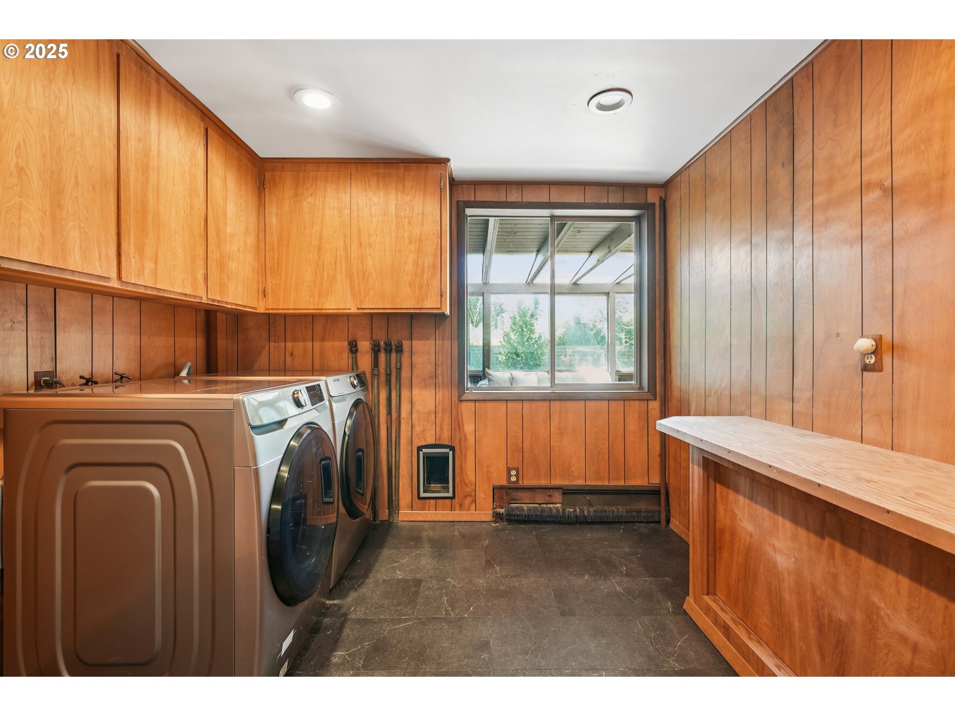5820 Southwest Miles Court Portland, OR 97219 - Photo 38 of 48 a utility room with dryer and washer