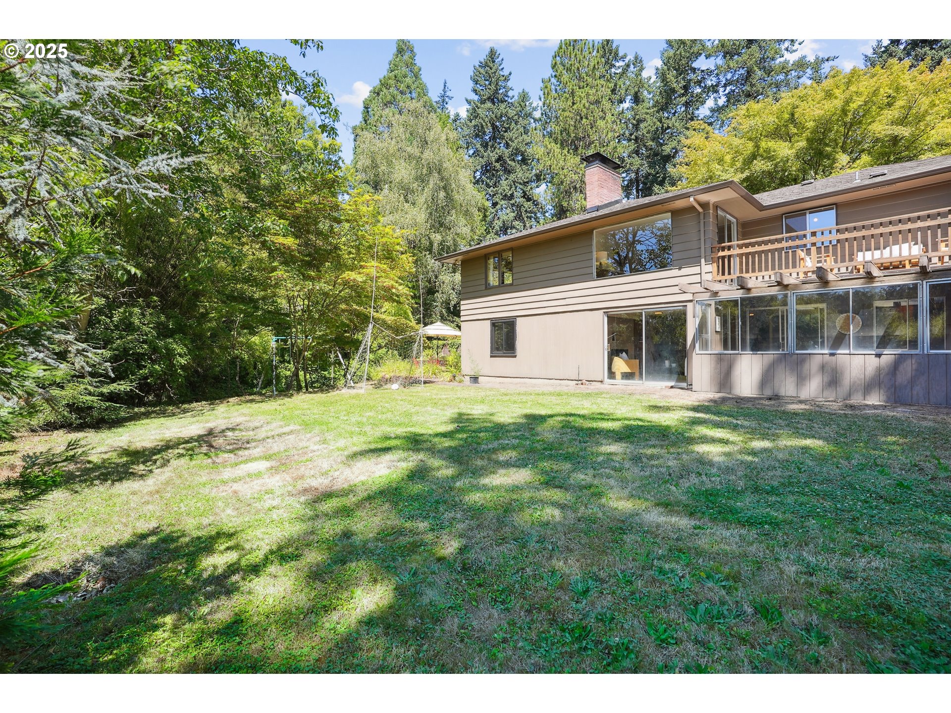 5820 Southwest Miles Court Portland, OR 97219 - Photo 45 of 48 a house view with a garden space
