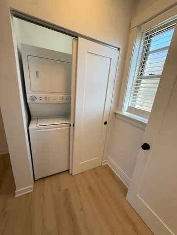 a view of a bathroom with a sink and a mirror