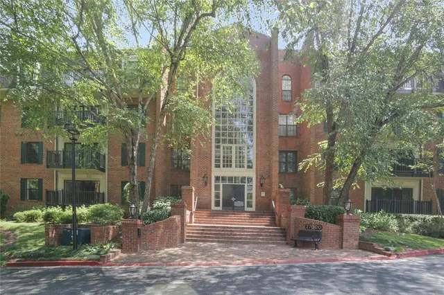 a view of a building with a garden