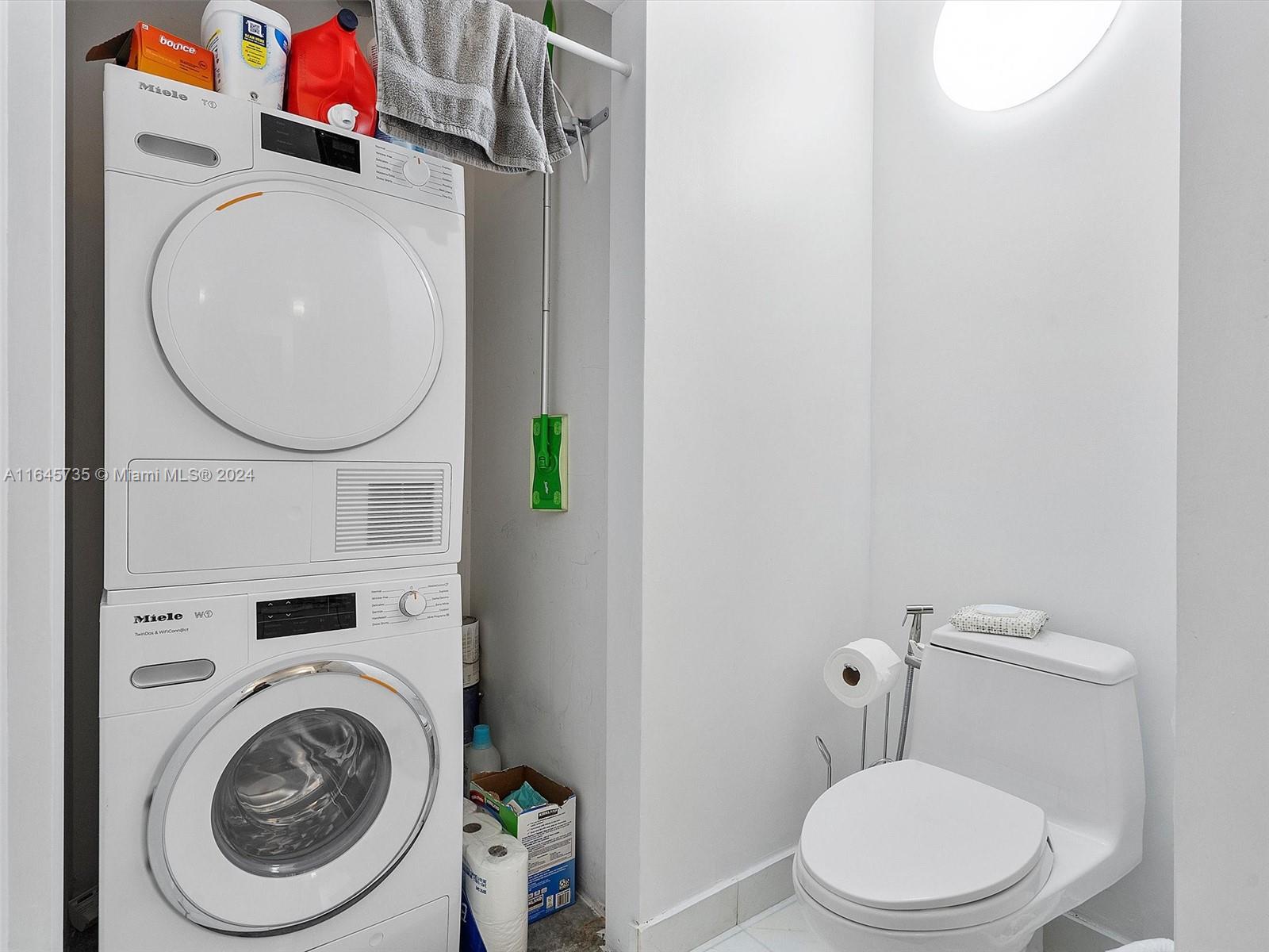 2001 Meridian Avenue, Unit 306 Miami Beach, FL 33139 - Photo 13 of 17 a bathroom with a toilet and a sink