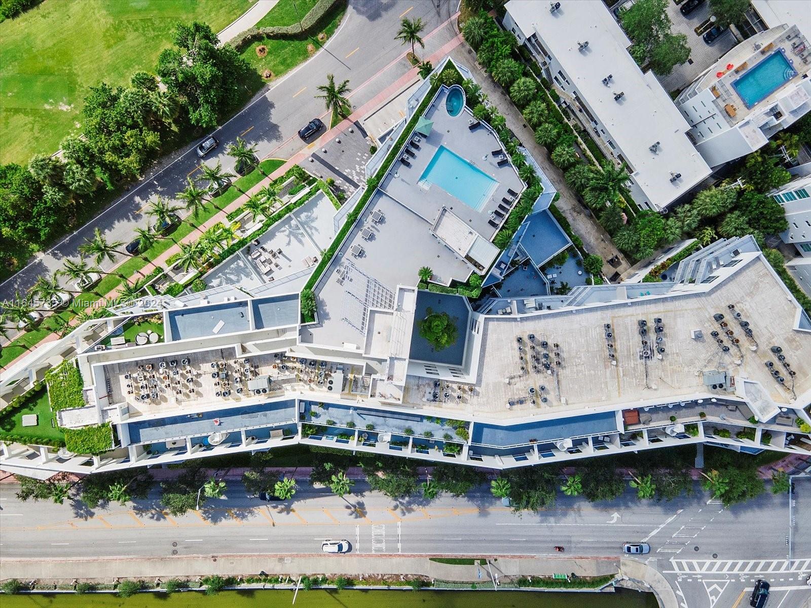 2001 Meridian Avenue, Unit 306 Miami Beach, FL 33139 - Photo 17 of 17 an aerial view of a house with a garden and deck