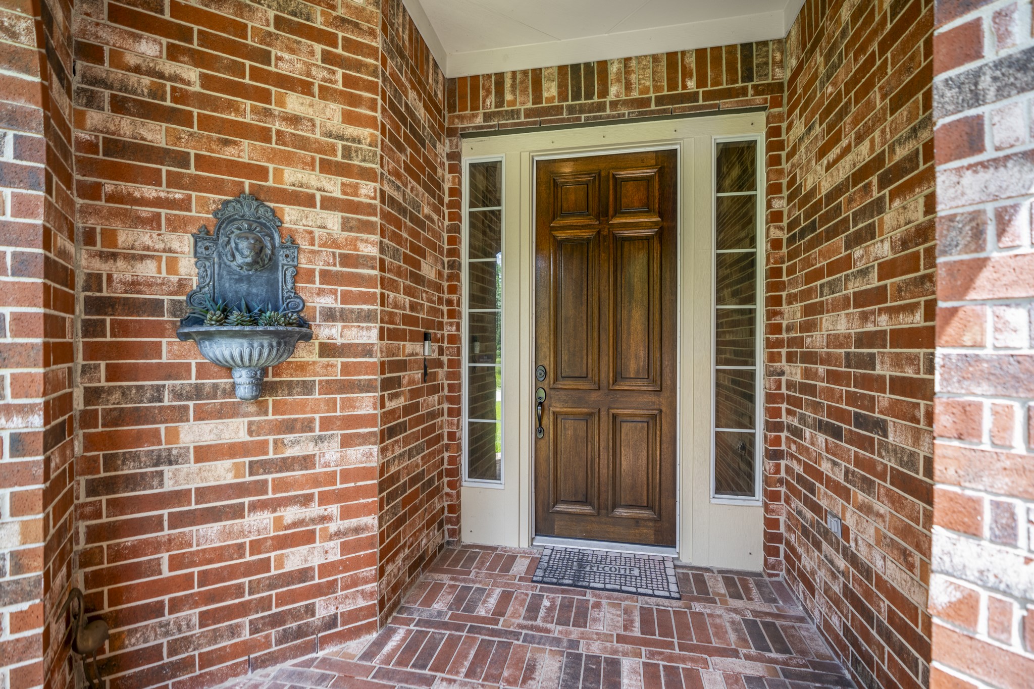 67 North Pentenwell Circle Spring, TX 77382 - Photo 3 of 50 front view of a brick building