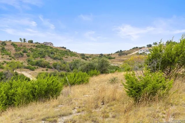 a view of lake with green space