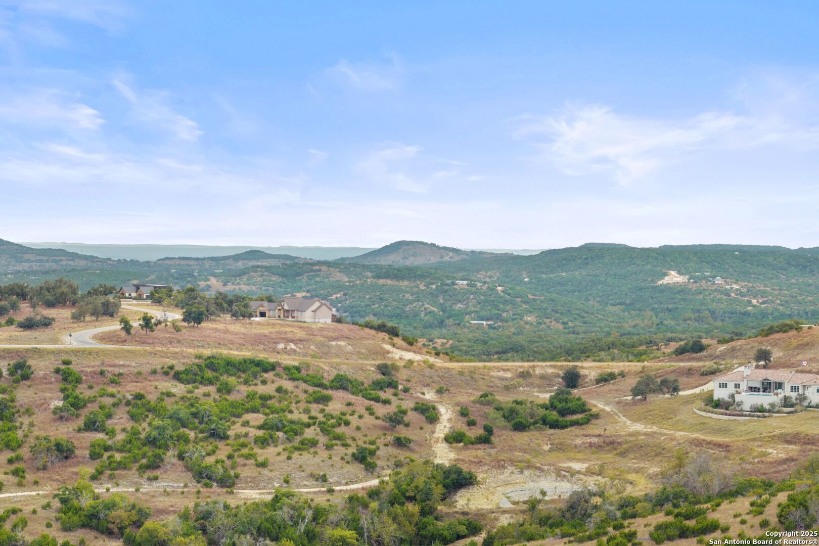 Tbd Tbd Star Point Circle Blanco, TX 78606 - Photo 3 of 25 a view of a lake with mountains in the background