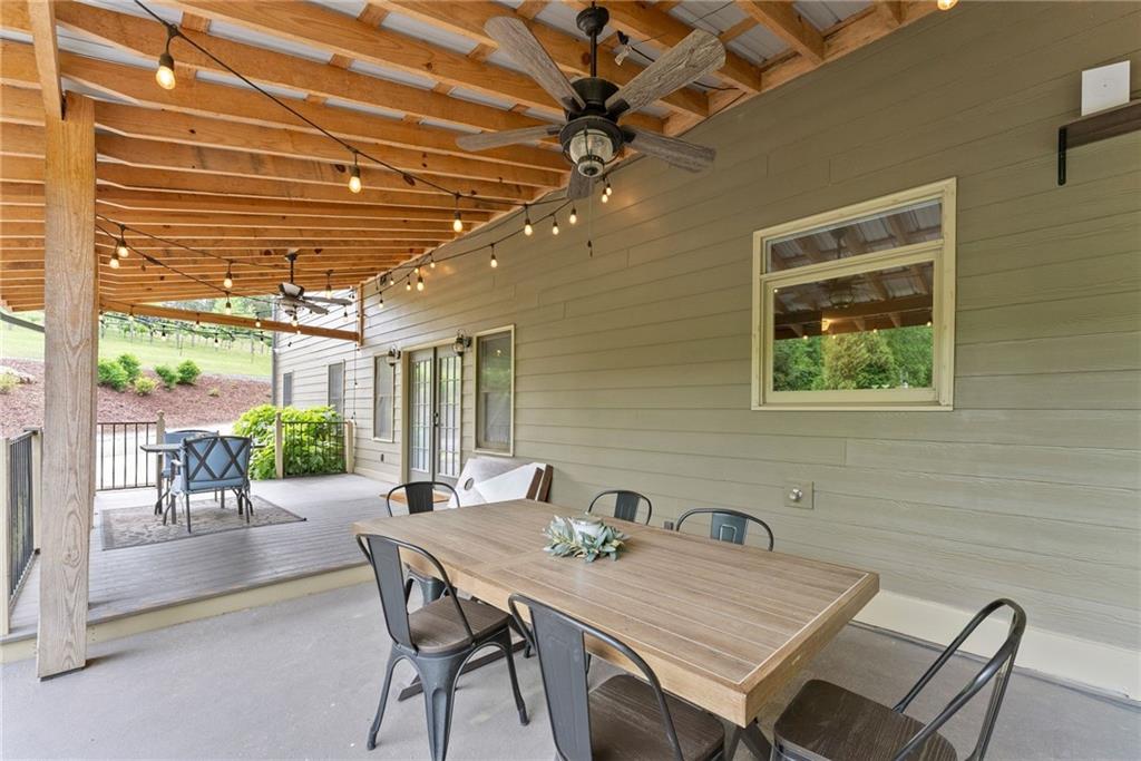 253 Happy Trails Way Jasper, GA 30143 - Photo 74 of 97 a view of a dining room with furniture window and outside view