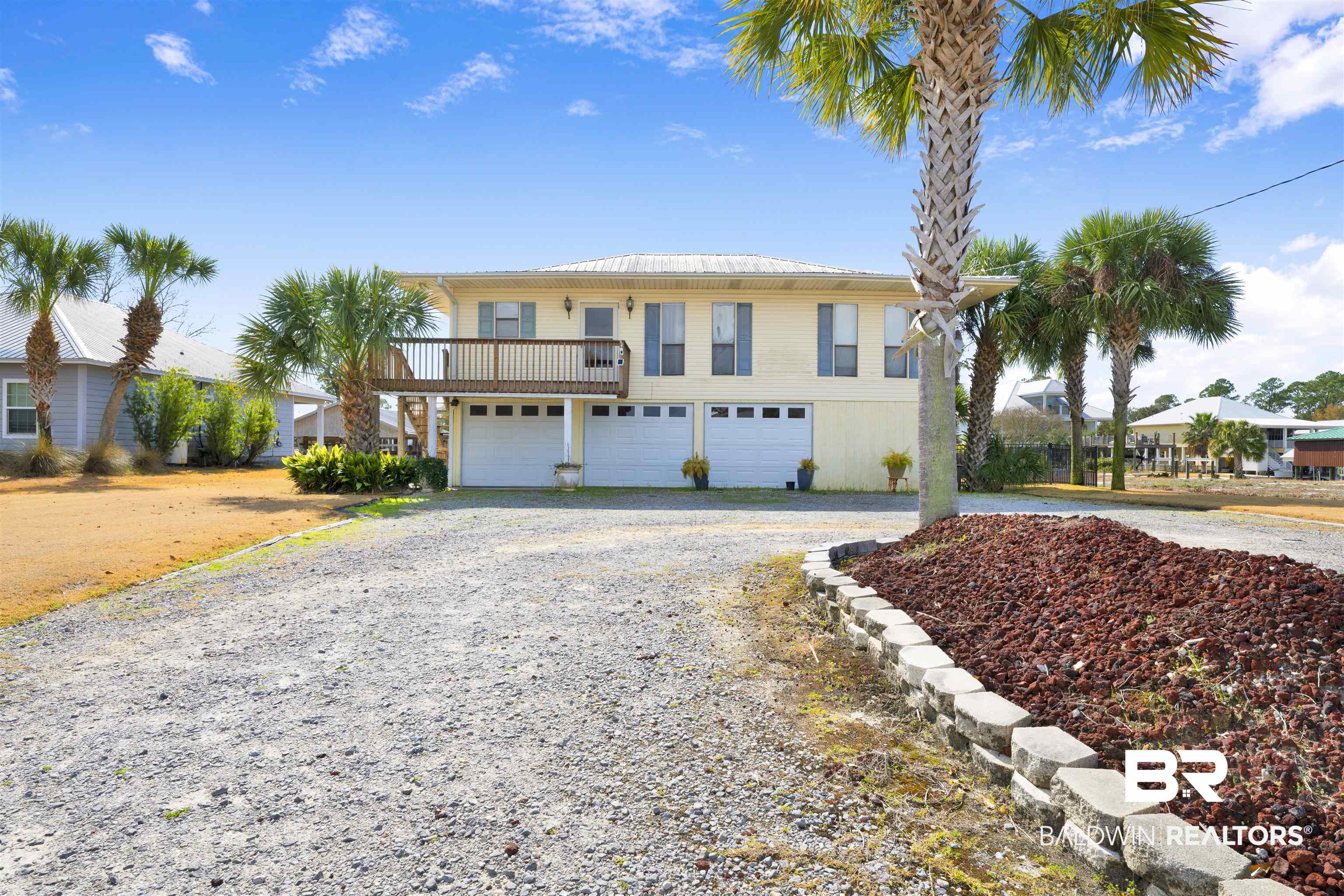 26222 Marina Road Orange Beach, AL 36561 - Photo 12 of 38 View of front facade with driveway and a garage