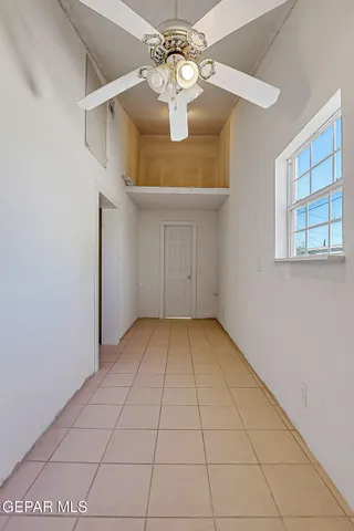 an aerial view of a city with streets and houses