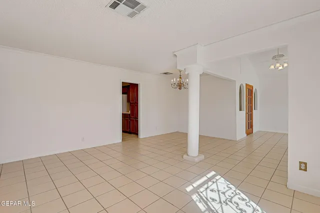 a view of an entryway with front door