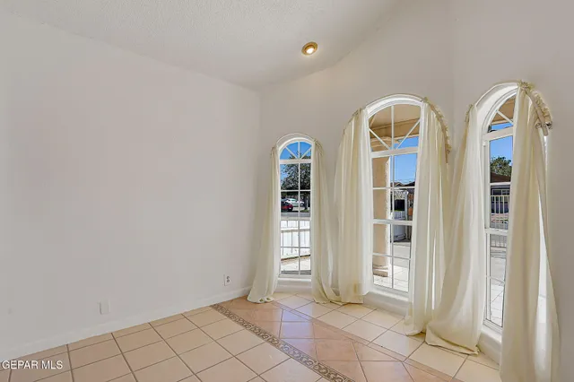 a kitchen with granite countertop cabinets stainless steel appliances and a sink