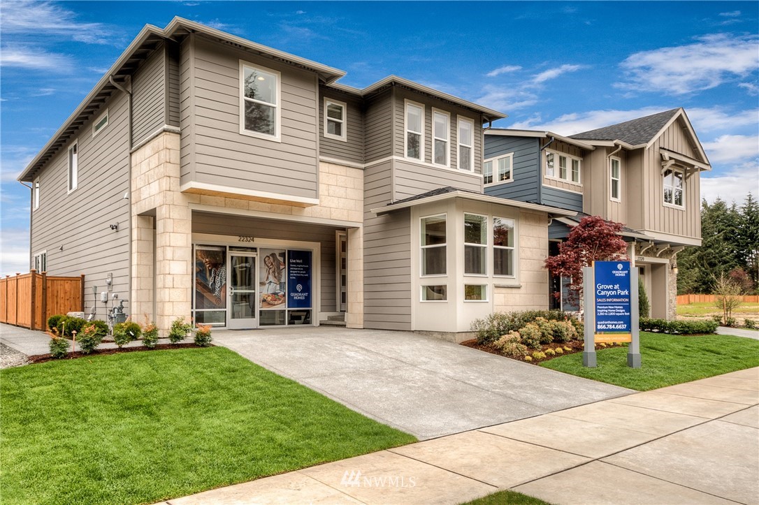 22324 44th Drive Southeast Bothell, WA 98021 - Photo 1 of 11 a front view of a house with a yard