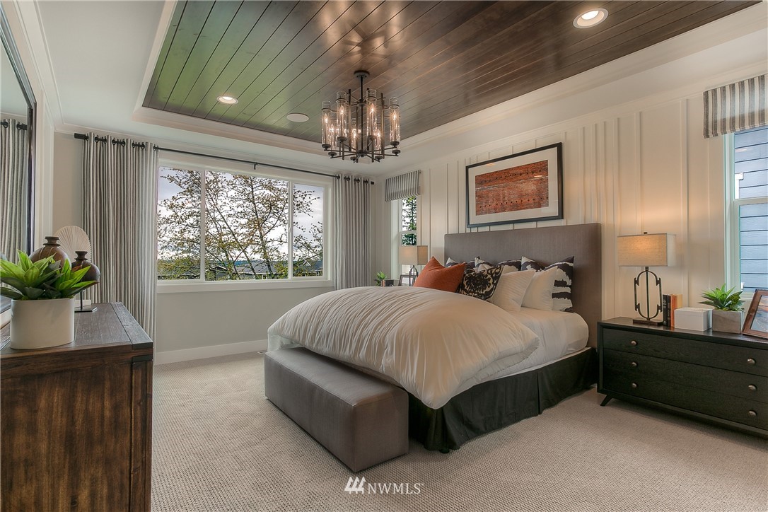 22324 44th Drive Southeast Bothell, WA 98021 - Photo 6 of 11 a spacious bedroom with a bed and a window