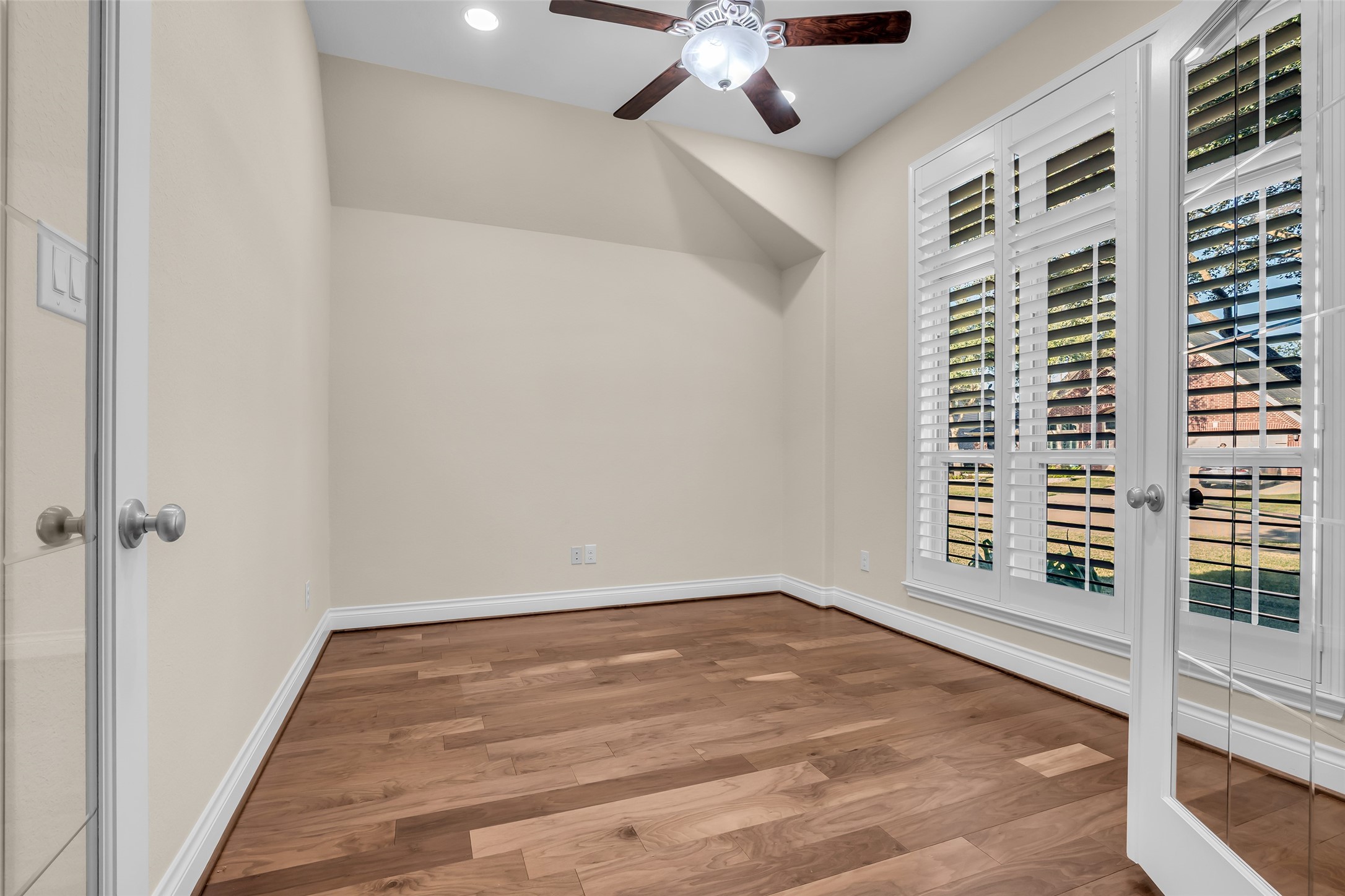 6306 Fisher Bend Lane Rosenberg, TX 77471 - Photo 3 of 26 A bright and versatile flex space styled as a functional home office with clean lines, natural light, and modern finishes ideal for productivity.