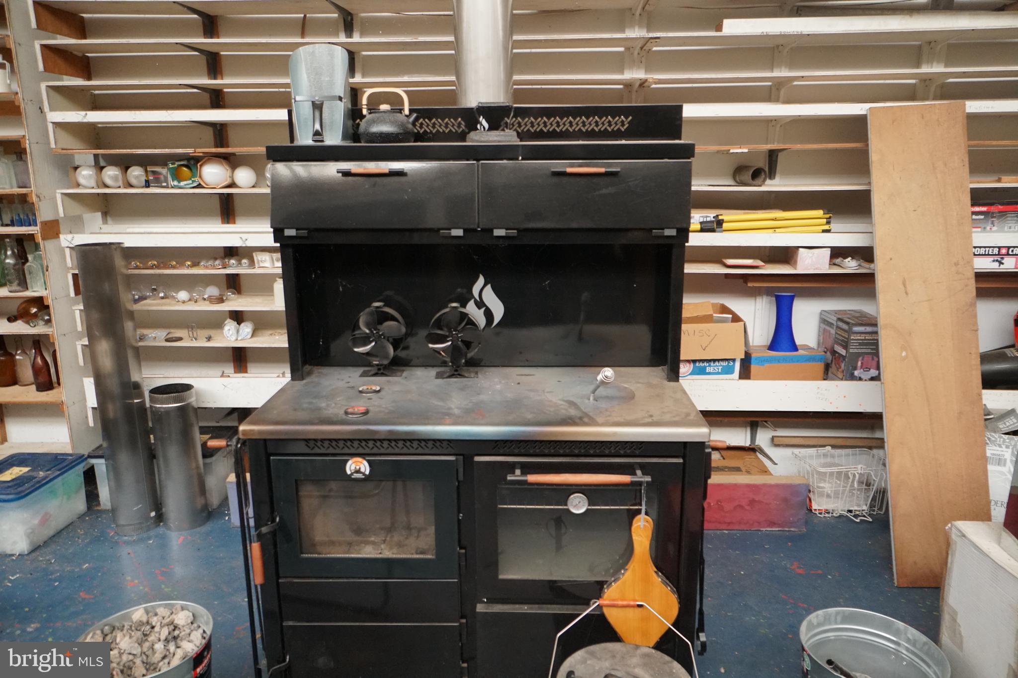 1873 Capito Hill Road Franklin, WV 26807 - Photo 60 of 72 a stove top oven sitting inside of a kitchen