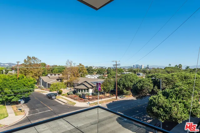 a view of a terrace with a garden