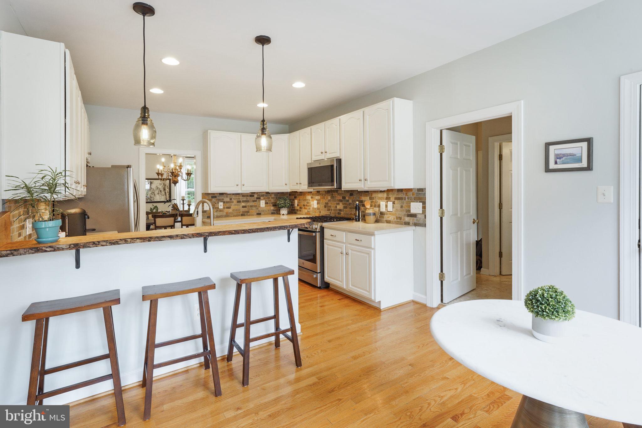 7163 Pine Ridge Road Marshall, VA 20115 - Photo 23 of 66 Breakfast Room Opens to Chef's Delight Kitchen