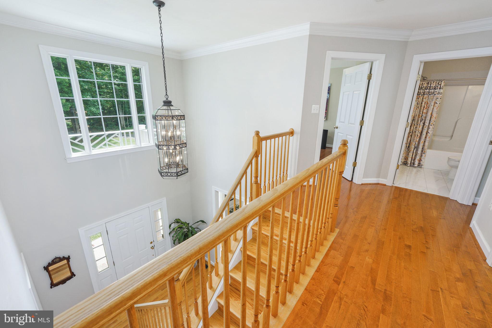7163 Pine Ridge Road Marshall, VA 20115 - Photo 41 of 66 Upper Level Hall w/HDWDs Overlooks 2-Story Foyer