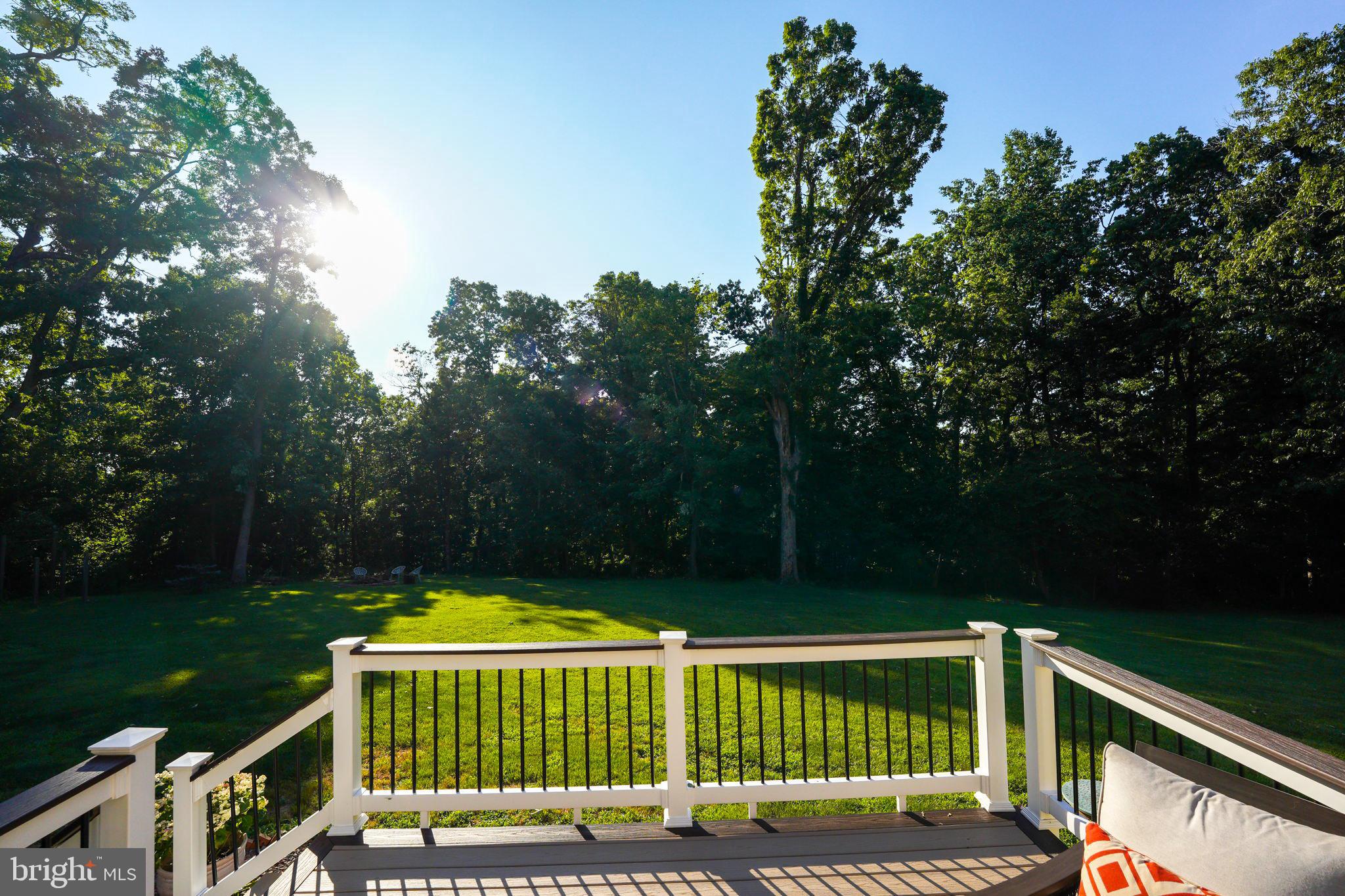 7163 Pine Ridge Road Marshall, VA 20115 - Photo 64 of 66 Deck with Serene, Treed Views of Level Backyard