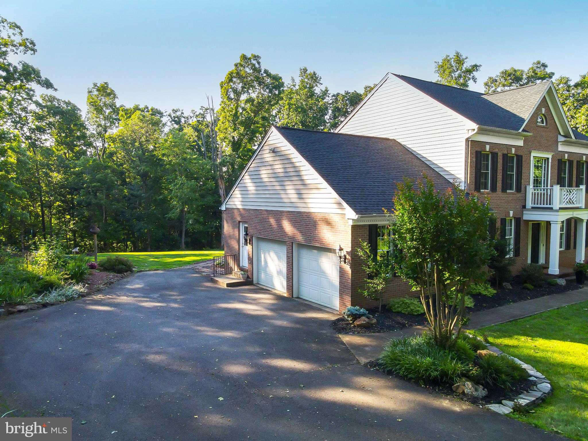 7163 Pine Ridge Road Marshall, VA 20115 - Photo 7 of 66 Large Paved Driveway Leads to 2-Car Garage