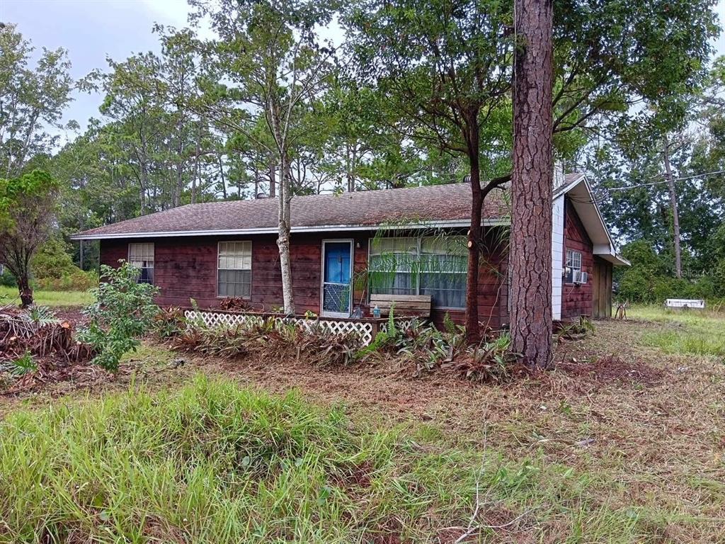 7 Shadow Lane Ormond Beach, FL 32174 - Photo 1 of 1 a view of house with backyard