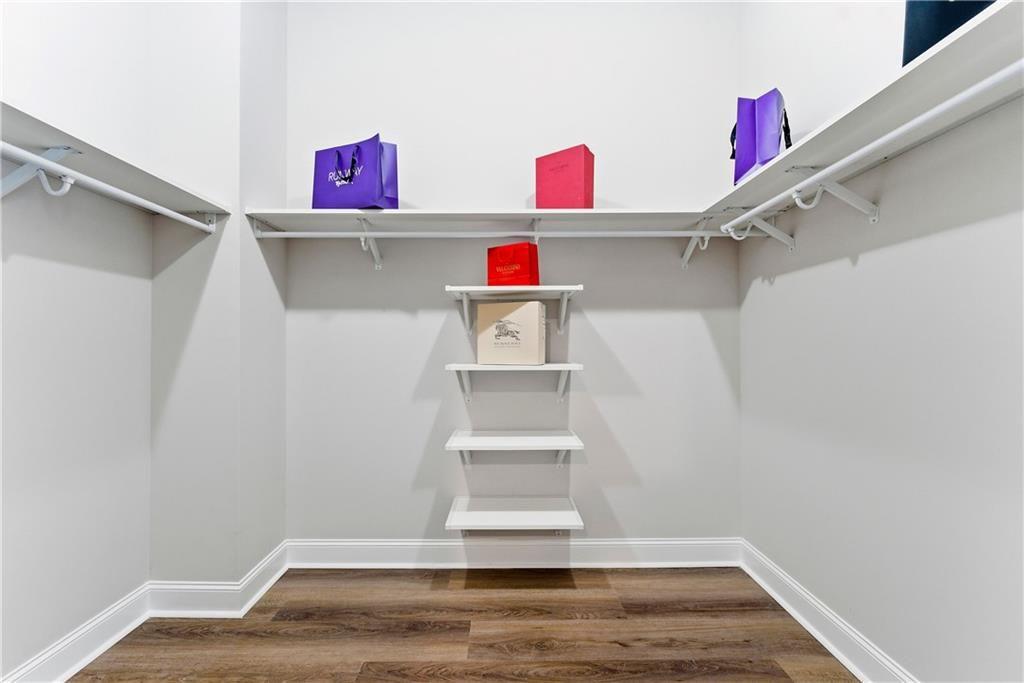 3360 Sarah Trail, Unit 1 Decatur, GA 30032 - Photo 21 of 41 a storage room with wooden floor