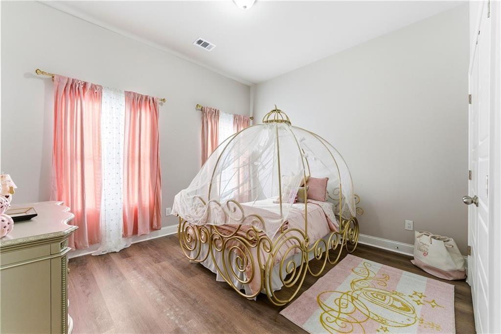 3360 Sarah Trail, Unit 1 Decatur, GA 30032 - Photo 24 of 41 a bedroom with bed and a window