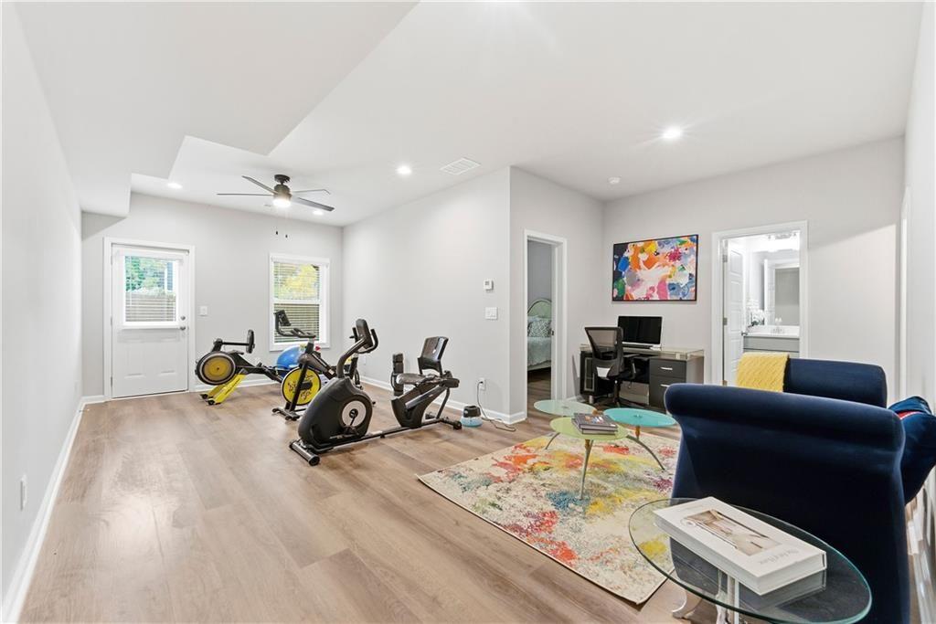 3360 Sarah Trail, Unit 1 Decatur, GA 30032 - Photo 27 of 41 a living room with furniture a couch and a flat screen tv