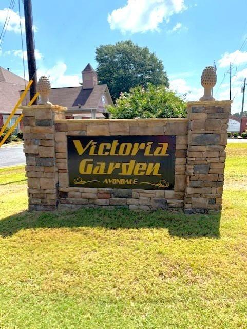 3360 Sarah Trail, Unit 1 Decatur, GA 30032 - Photo 37 of 41 a sign broad on the side of the building